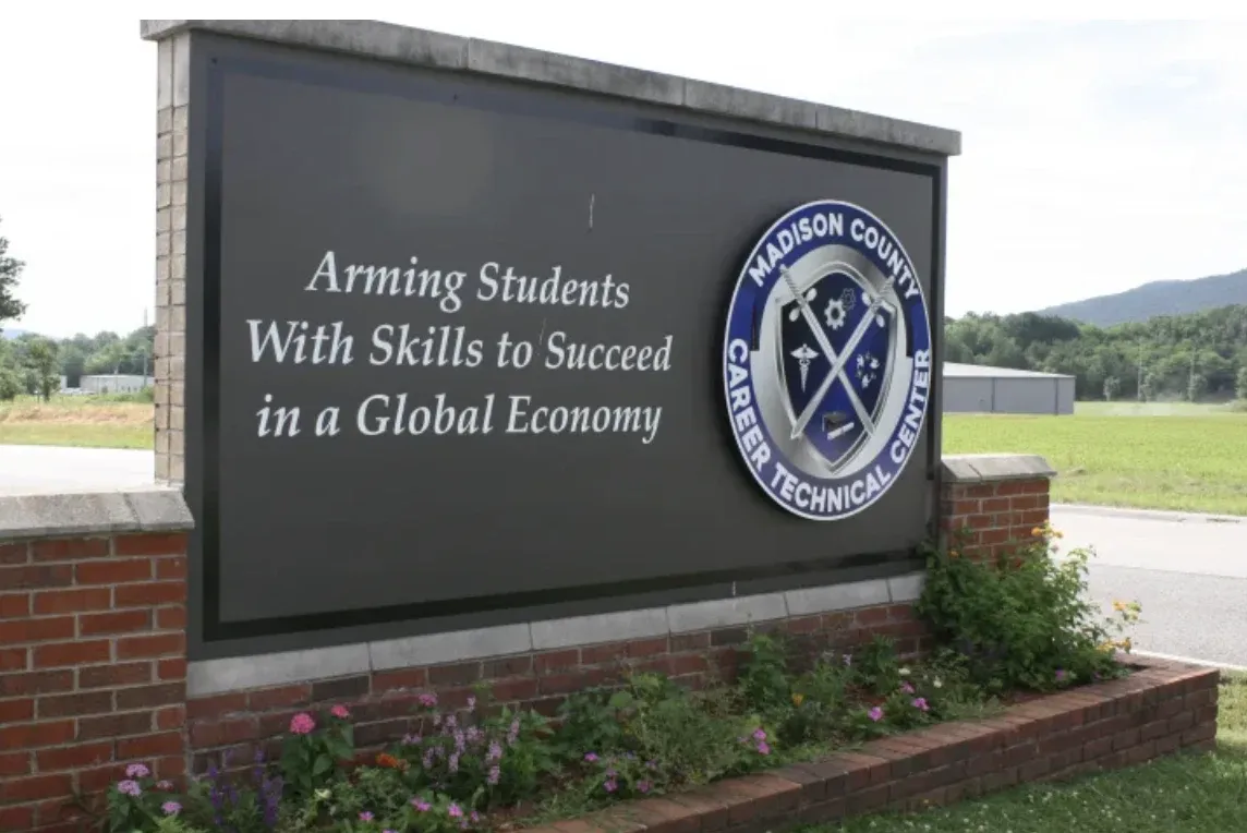 Madison County Career Technical Center sign in front of a brick building.